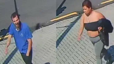 Imagem mostra um homem de camiseta azul e calça preta e uma mulher com top preto e calça cinza andando em uma calçada dom paver.